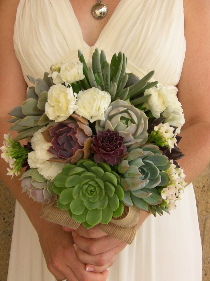 Succulent wedding bouquet green, purple and white.