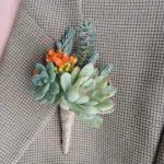 boutonniere with orange bloom