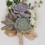 bridal bouquet designed with succulent echeverias with filler foliage and flowers
