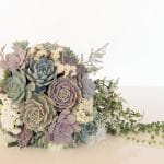 succulent wedding bouquet with pastel colors.