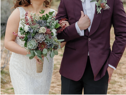 Sabrina bouquet with burgundy accents.