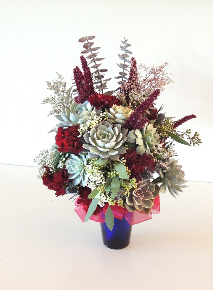 Blue and burgundy succulent bouquet